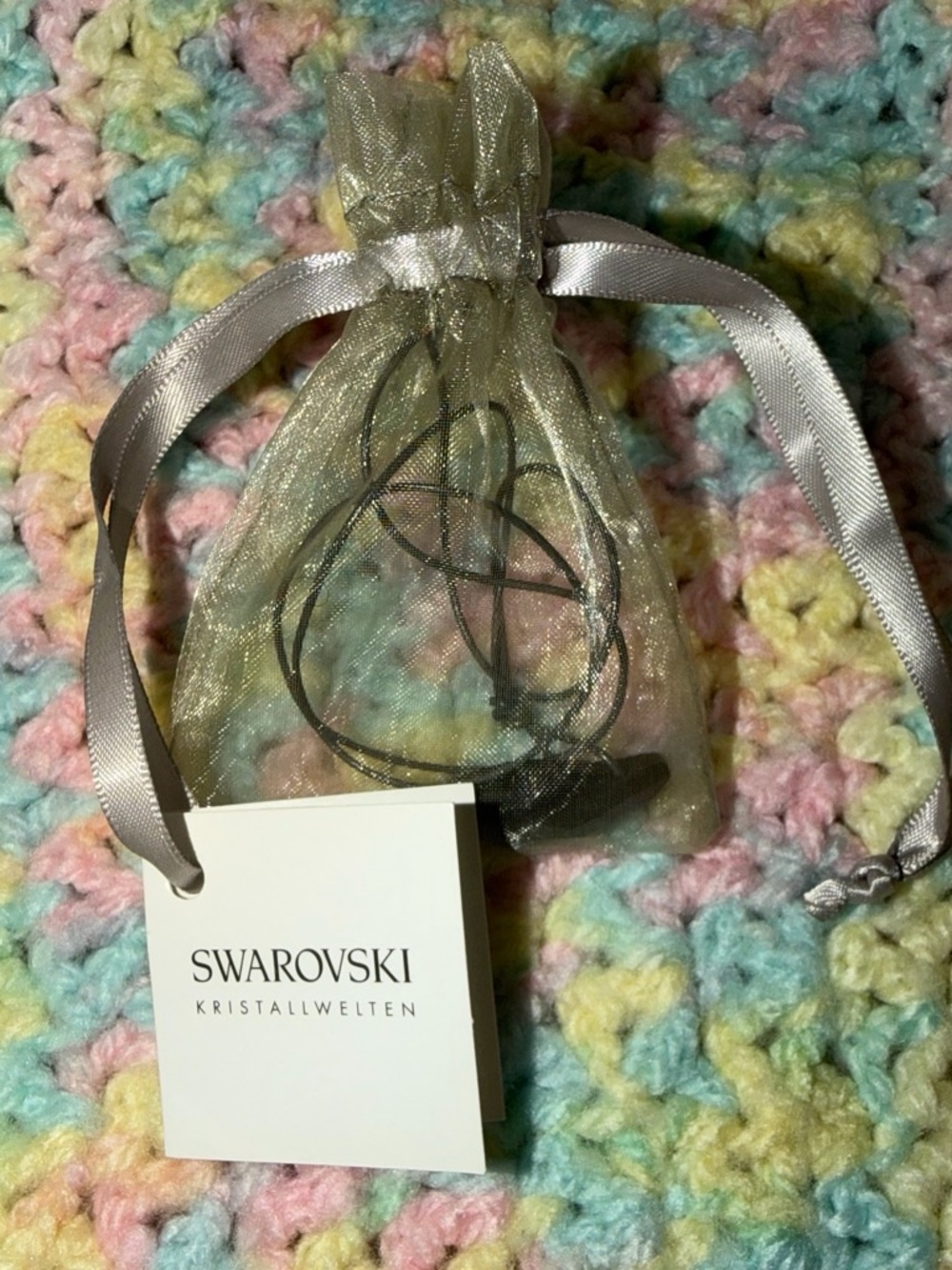 Swarovski Shimmering Gold Jewelry Pouch with Ribbon with black onyx on a string
